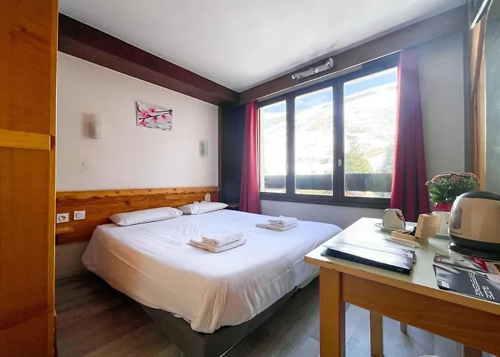 Отель Atmosphere Ле дез Альп